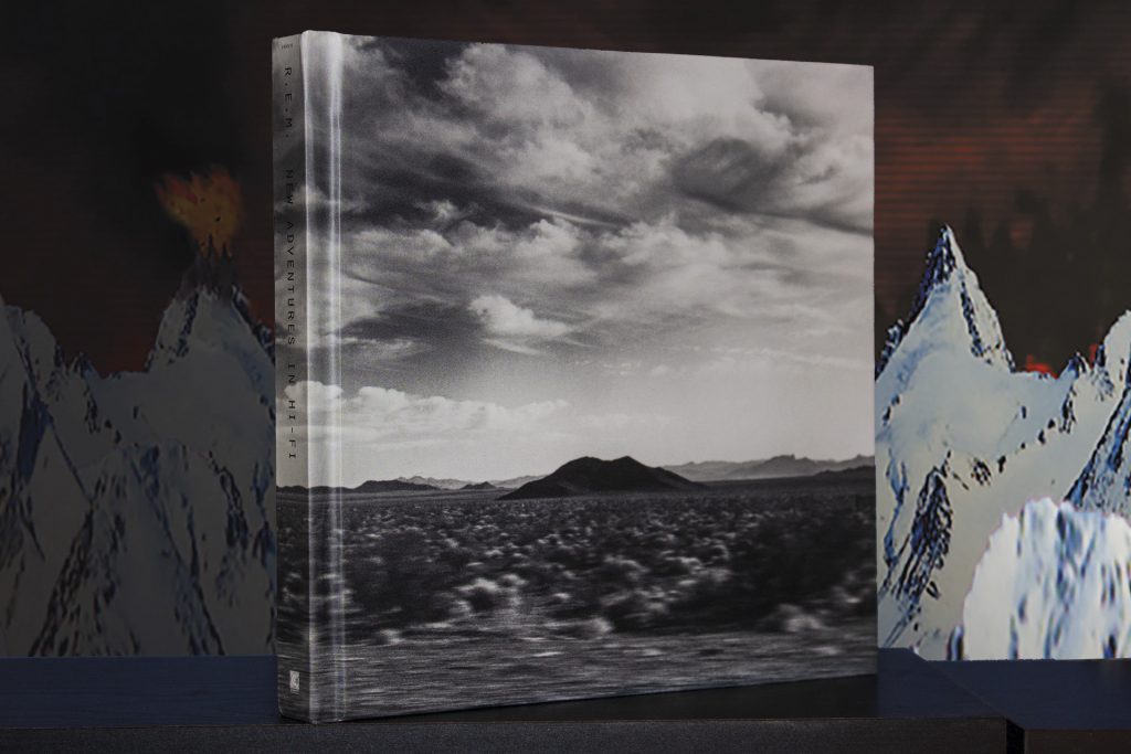 Black-and-white music book on background of digital mountains